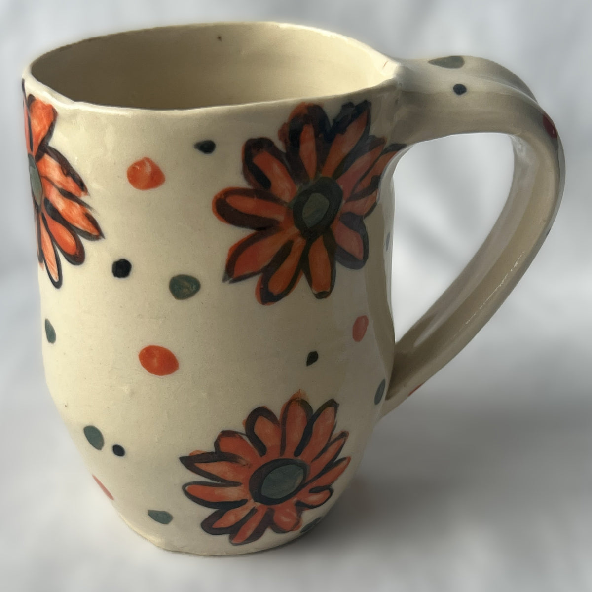 White Ceramic Mug with Red Flower Design
