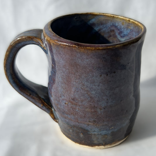 Ceramic Mug with a smooth brown purple surface