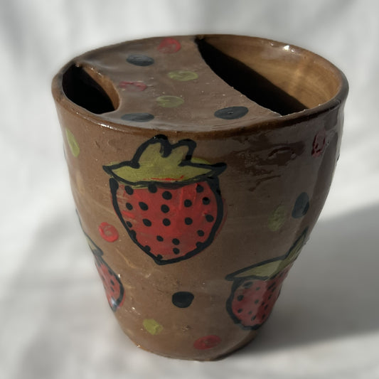 Ceramic handless partial lidded cup, brown with strawberry designs on it