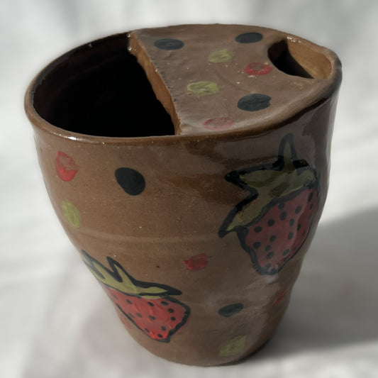 Ceramic handless partial lidded cup, brown with strawberry designs on it