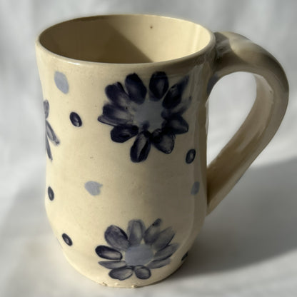 mug with blue floral patterns on a white background