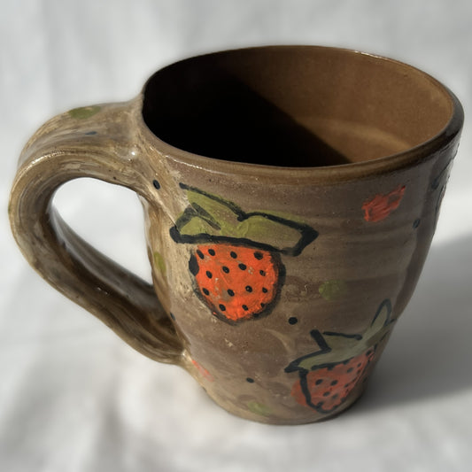 brown Ceramic mug with strawberry design on a white background