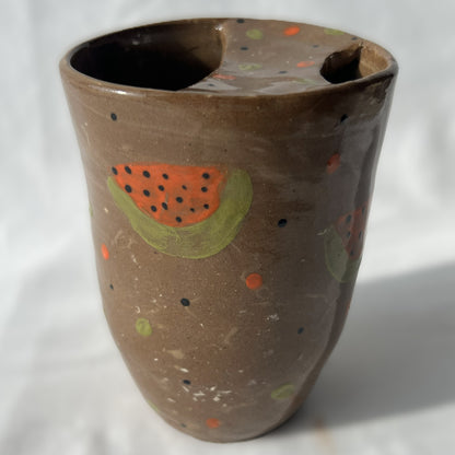 Ceramic handless partial lidded cup, brown with watermelons on it