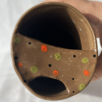 Ceramic handless partial lidded cup, brown with watermelons on it