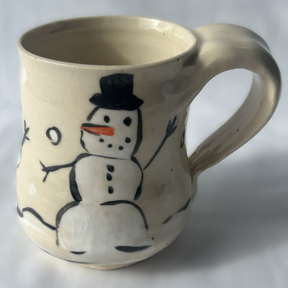 White Ceramic Mug with a Snowman design