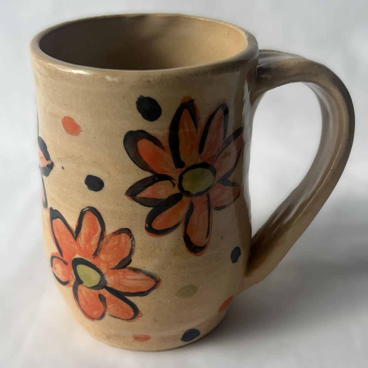 Tan Ceramic Mug with Red Flower Design