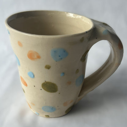 White Ceramic Mug with Orange, Green and Blue Polka Dot Design