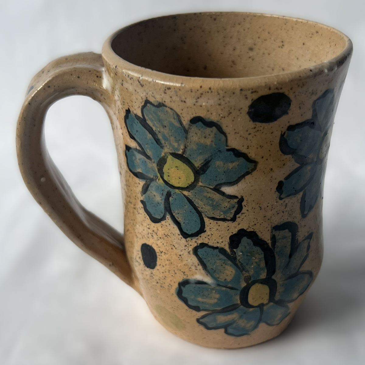 Tan Speckled Ceramic Mug with Teal Flower Design