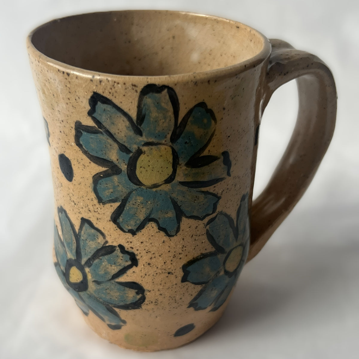 Tan Speckled Ceramic Mug with Teal Flower Design