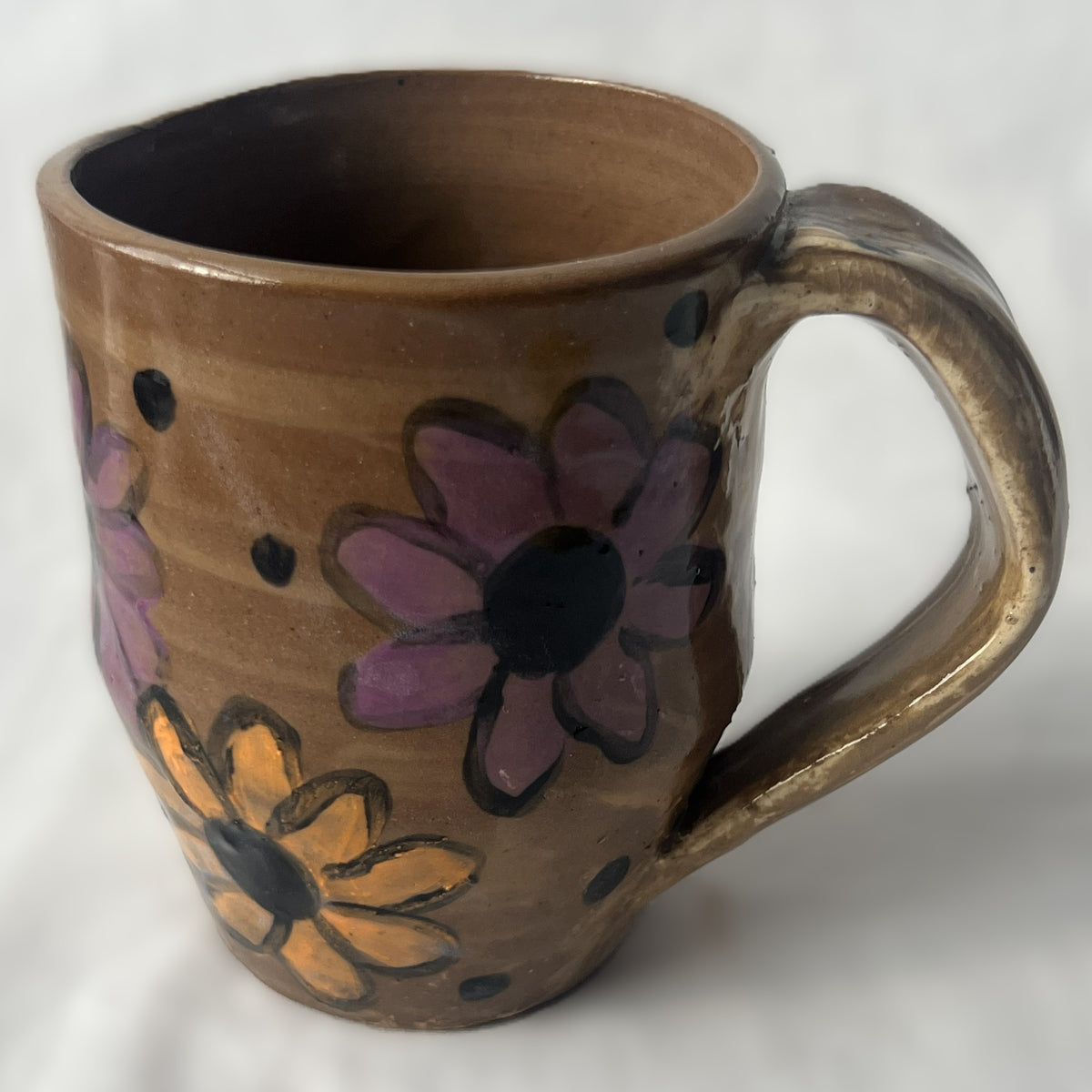 Brown Ceramic Mug with Orange and Purple Flower Design