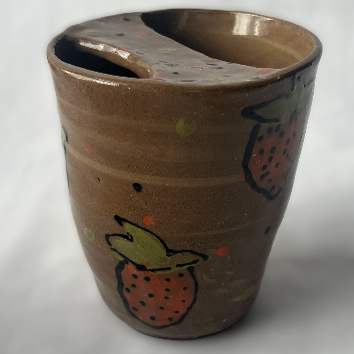 Handle Less Brown Ceramic Tumbler with a Partial Lid Designed with Drawn Strawberries 