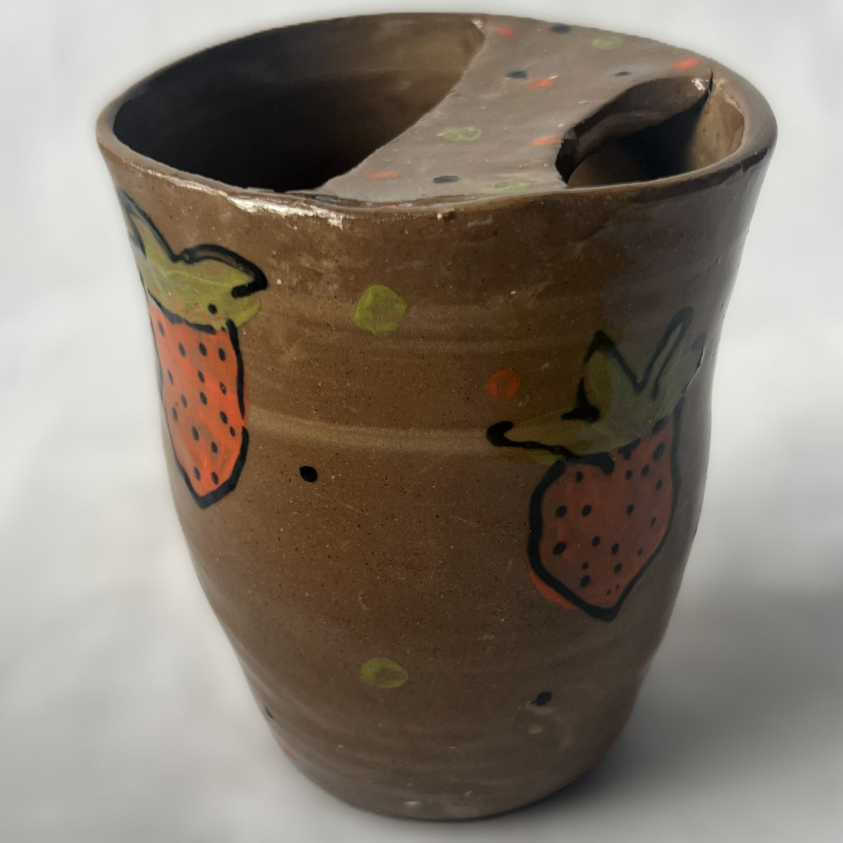 Handle Less Brown Ceramic Tumbler with a Partial Lid Designed with Drawn Strawberries 