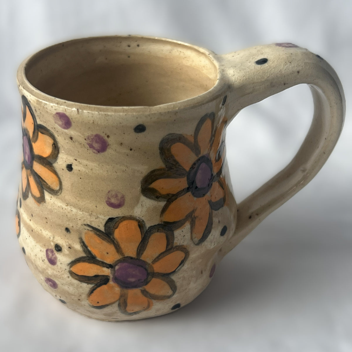 Tan Ceramic Mug with Orange Flower Design