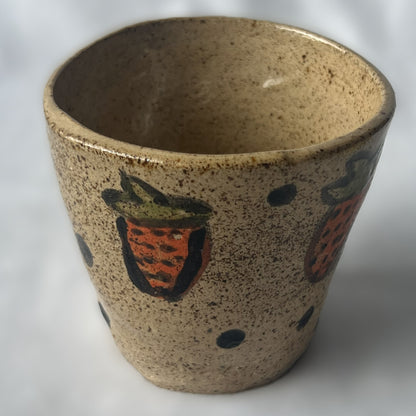 Handle less tumbler with a strawberry design and brown speckled background