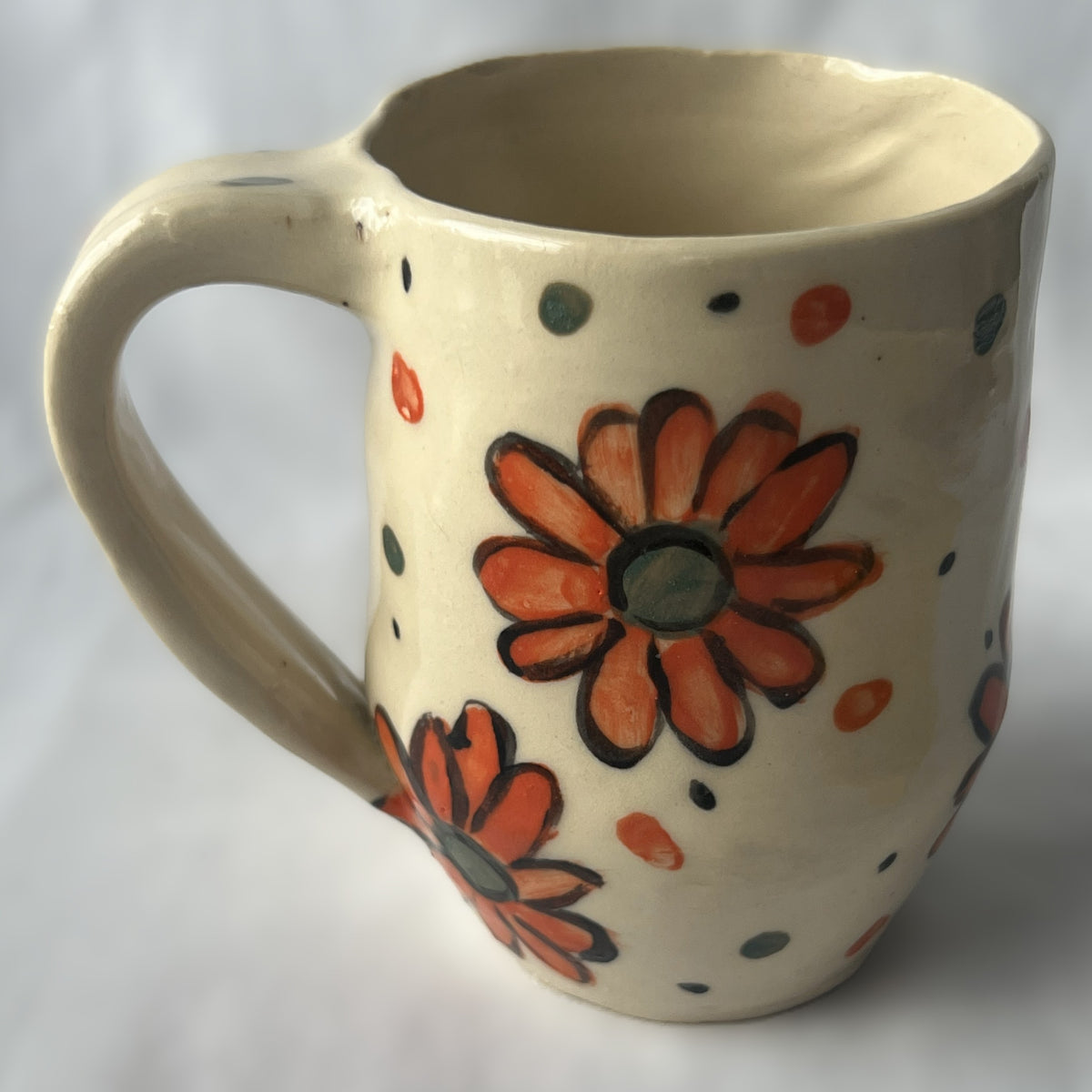 White Ceramic Mug with Red Flower Design