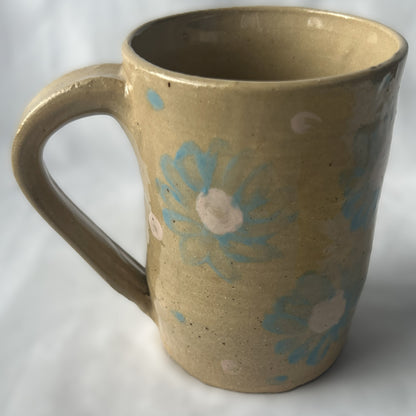 Tan Ceramic Mug with Light Blue Flower Design