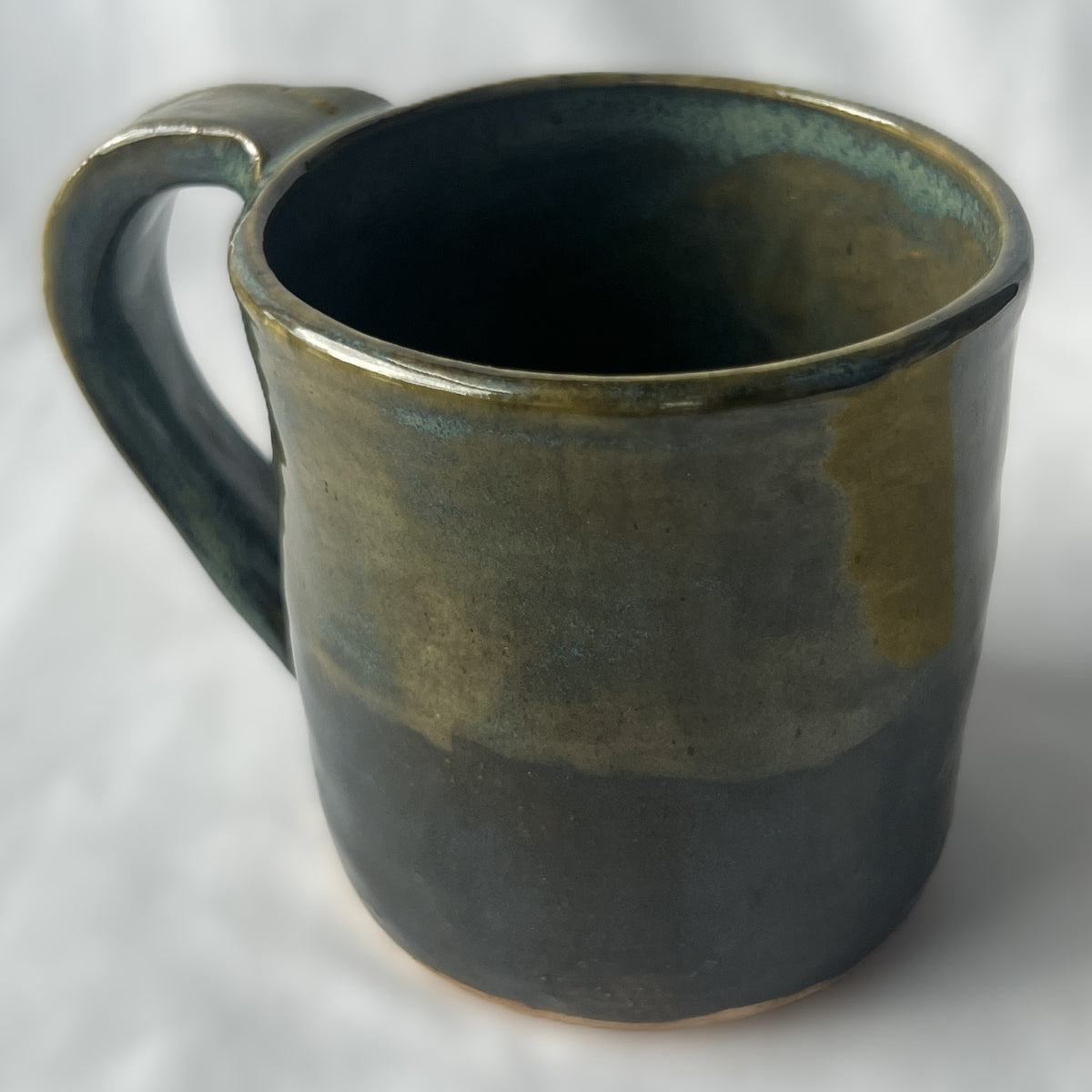 Ceramic Mug with half Green glaze and half blue glaze 