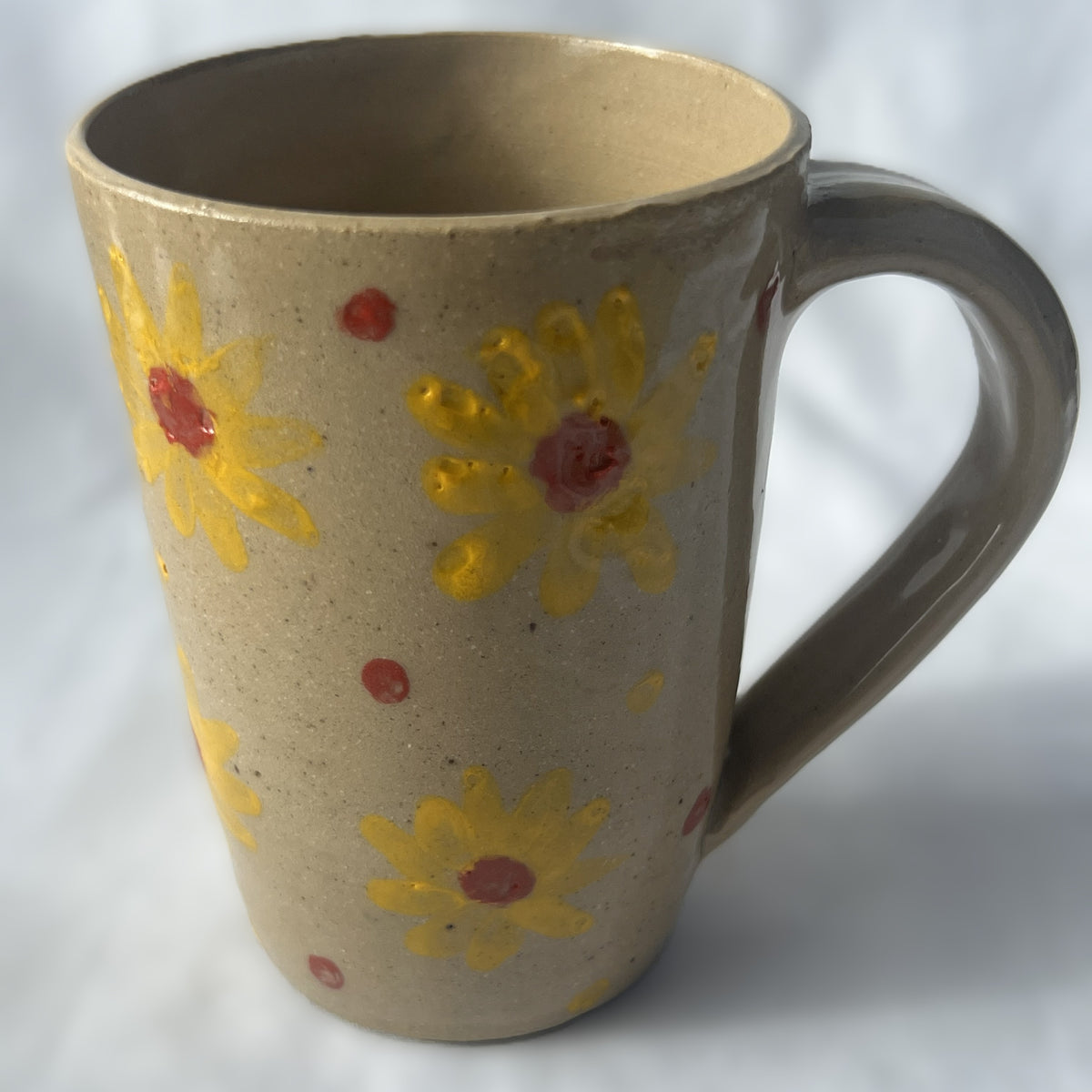 Tan Ceramic Mug with Yellow Flower Design