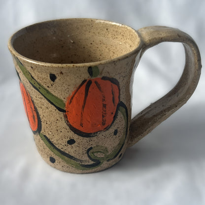 Brown Speckled Ceramic Mug with a Pumpkin Design