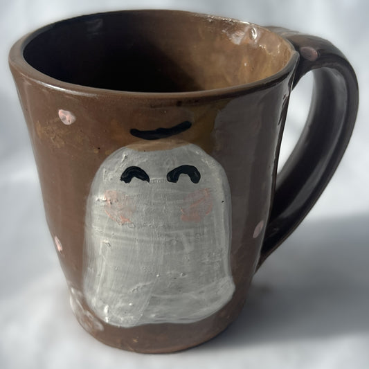 Brown Ceramic Mug with Drawn Ghost in a Cowboy Hat Design