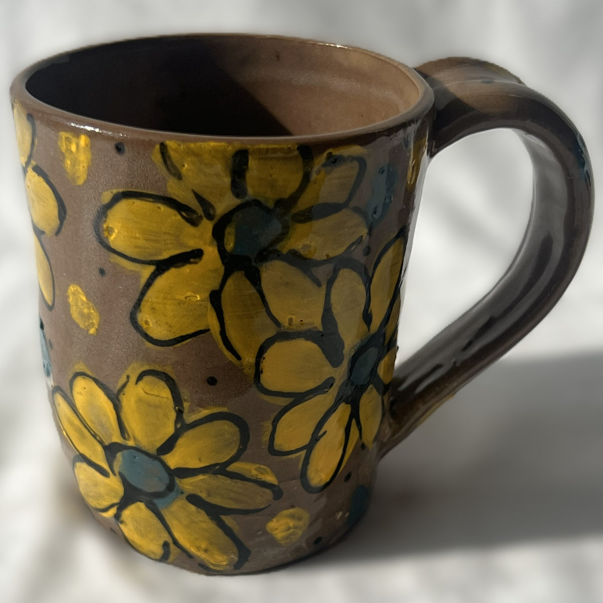 Brown Ceramic Mug with Yellow Flower Design