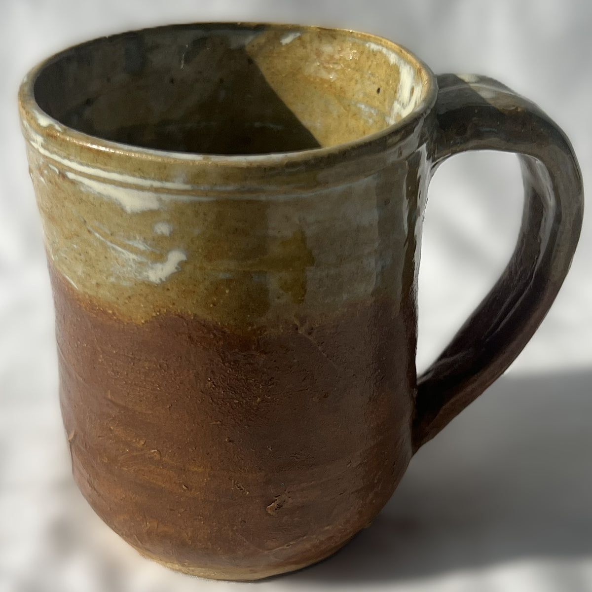 Brown Ceramic Mug with half tan glaze and half brown glaze 