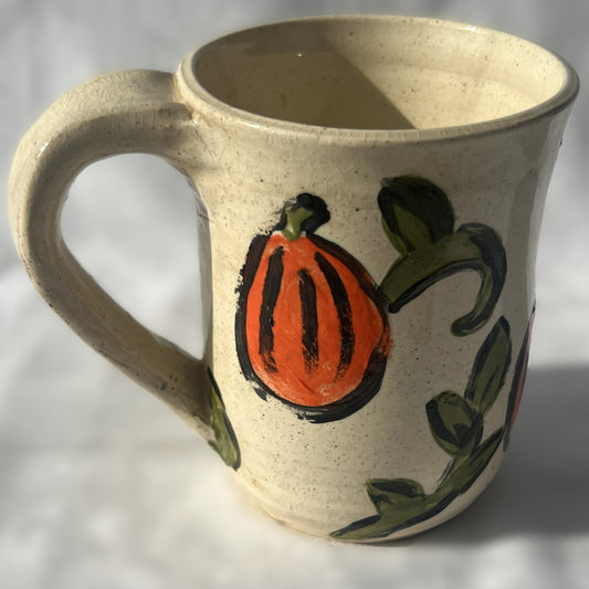 White Ceramic Mug with a Pumpkin Design