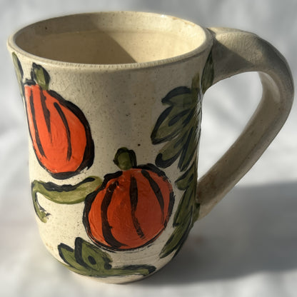 White Ceramic Mug with a Pumpkin Design