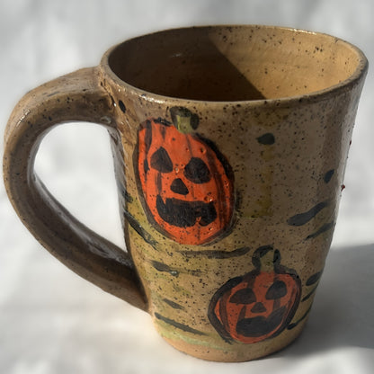Brown Speckled Ceramic Mug with a Pumpkin Design
