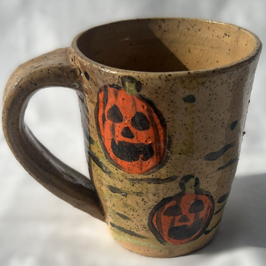 Brown Speckled Ceramic Mug with a Pumpkin Design
