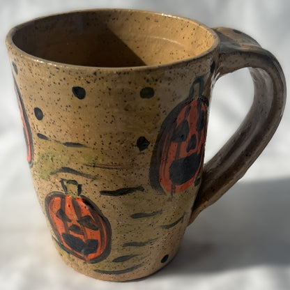 Brown Speckled Ceramic Mug with a Pumpkin Design