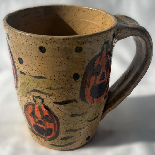 Brown Speckled Ceramic Mug with a Pumpkin Design
