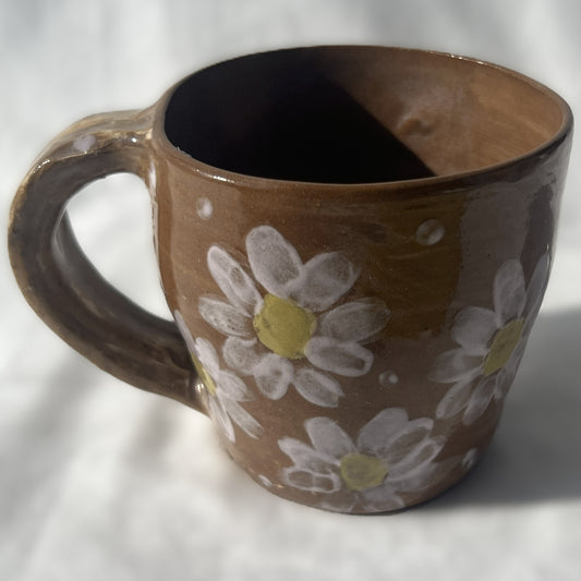 Brown Ceramic Mug with White Flower Design