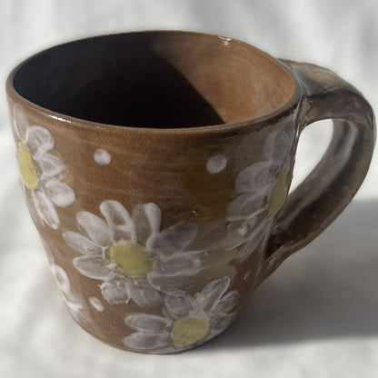Brown Ceramic Mug with White Flower Design