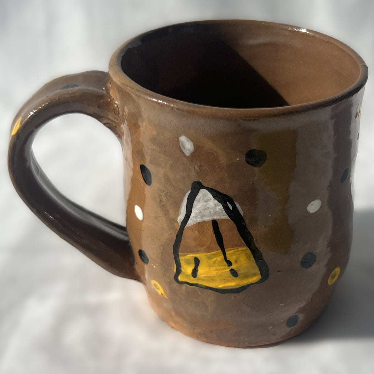 Brown Ceramic Mug with Drawn Candy Corn Design