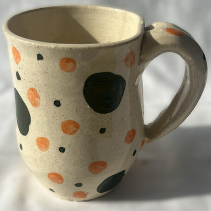 White Ceramic Mug with green and orange polka dot design